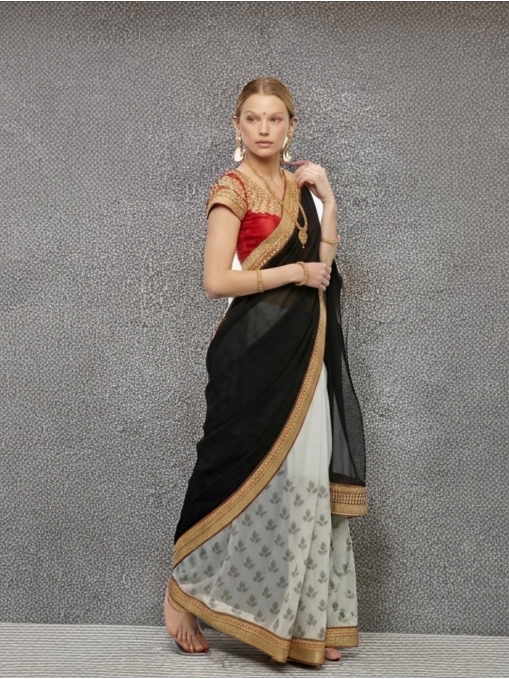 Elegant Black and Grey Saree with Gold Trim